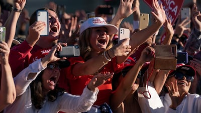 Supporters of President Donald Trump cheer as he walks off stage after speaking during a campaign rally at Phoenix Goodyear Airport, in Goodyear, Arizona. AP Photo