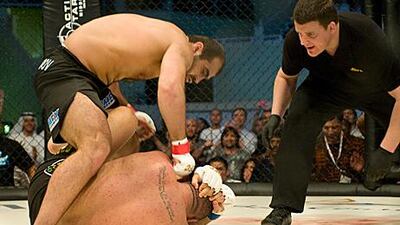 Shamil Abdurahimov defeated Marcos Oliveira, on the floor, by technical knockout.