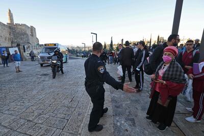 An Israeli police officer in Jerusalem's Old City after an incident in which a woman was fatally shot. AFP