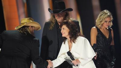 Susan Sarandon and Trace Adkins present the Album of the Year award to Chris Stapleton. Reuters