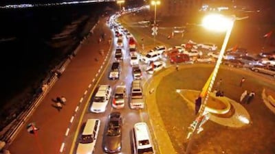 The Corniche was jammed for hours with automobiles during the National Day parade in Ras al Khaimah. Jeff Topping / The National