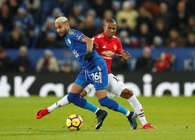 Leicester City winger Riyad Mahrez, left. Andrew Boyers / Reuters