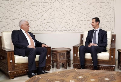 Syrian President Bashar al-Assad (R) meeting with Iraqi National Security Adviser Faleh al-Fayad (L) in Damascus. EPA/SANA