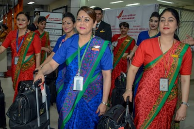 Air India airline crew members have been barred from sporting religious accessories in the new rules. AFP
