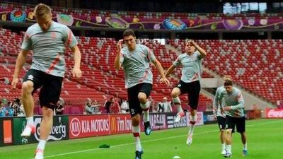 Polish national football team take part in a training session at the National Stadium in Warsaw, on the eve of the Euro 2012 opener against Greece. Christof Stache / AFP