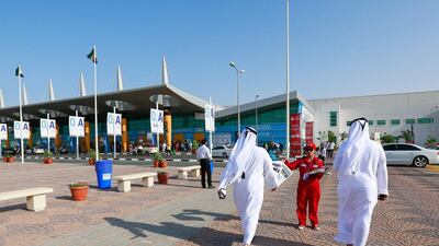 Visitors arrive early for the second day of the Dubai Airshow. Victor Besa for The National