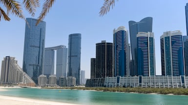 Buildings in Al Reem Island, Abu Dhabi. Real estate transactions in the emirate rose 112 per cent year-on-year in the first half of 2026. Khushnum Bhandari / The National