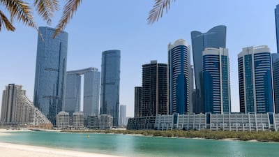 Buildings in Al Reem Island, Abu Dhabi. Real estate transactions in the emirate rose 112 per cent year-on-year in the first half of 2026. Khushnum Bhandari / The National