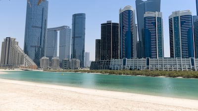 Buildings in Al Reem Island, Abu Dhabi. Real estate transactions in the emirate rose 112 per cent year-on-year in the first half of 2026. Khushnum Bhandari / The National