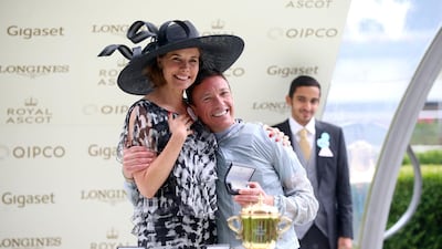 Darcey Bussell, left, presents jockey Frankie Dettori with the trophy for winning the Queen Mary Stakes with Raffle Prize. Press Association