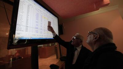 The Iraqi Stock Exchange has had its challenges – from a lack of liquidity to serious security concerns. Above, investors monitor stock prices at the bourse in Baghdad in February. Ahmed Saad / Reuters