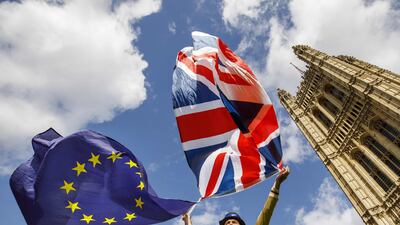 Pro-European Union demonstrators protested outside the Houses of Parliament in central London against the first vote on a bill to end Britain's membership of the EU. Tolga Akmen/ AFP