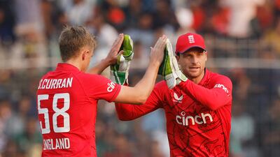 England bowler Sam Curran celebrates with Jos Buttler after taking the wicket of Bangladesh's Litton Das for nine. Reuters