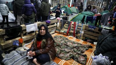 An Iraqi Kurdish migrant in a warehouse where some people were taken on the Belarusian side of the border. Reuters