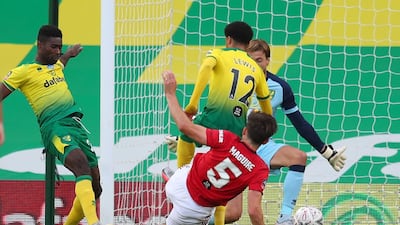 United's Harry Maguire scrambles home the winner. Reuters