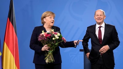 Germany's assessment of Nord Stream 2 was written when Angela Merkel was chancellor and Olaf Scholz was finance minister. AP