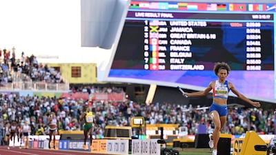 Sydney McLaughlin crosses the finish line to win the women's 4x400m relay final at the World Athletics Championships. AFP