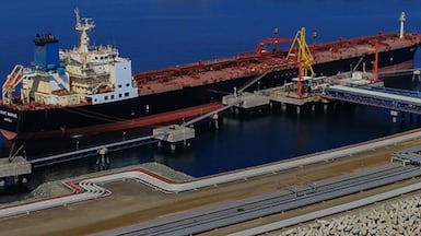 Oman's Sohar port. The Sharjah-Oman trade corridor connects UAE companies to port facilities in Oman. Saleh Al Shaibany