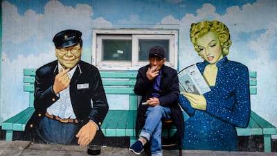 A mural depicting South Korean TV host Song Hae and US actress Marilyn Monroe at a cinema in Seoul. AFP