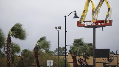 McDonald's signage stands damaged from Hurricane Michael in Panama City, Florida. Bloomberg