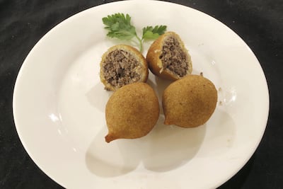 Fried kibbeh is displayed at the Durra market in Al-Madina Al-Munawara street in Amman, Jordan. (Salah Malkawi for The National)