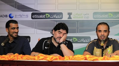 Diego Maradona pretends to sleep at another press conference.