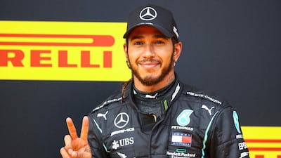 Mercedes' British driver Lewis Hamilton celebrates winning the Formula One Styrian Grand Prix. AFP