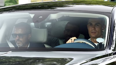 Manchester United's Cristiano Ronaldo arrives at Carrington Training Ground, Manchester, England, Tuesday July 26, 2022. (Peter Powell / PA via AP)
