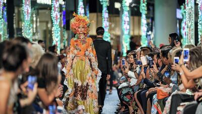 Models walk up and down the catwalk during the Dolce & Gabbana Fashion Show at Dubai Mall.