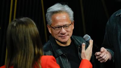 Jensen Huang, chief executive officer of Nvidia, speaks to the media before his keynote address at the Nvidia AI summit in Washington. Bloomberg