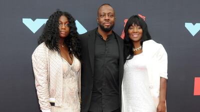 Wyclef Jean, centre, arrives at the MTV Video Music Awards on Monday, August 26. EPA