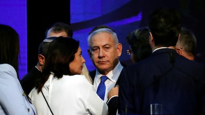 Israeli Prime Minister Benjamin Netanyahu looks on after speaking to supporters at his Likud party headquarters. Reuters