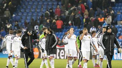 Basel players don't look pleased at the final whistle. Patrick Straub / EPA