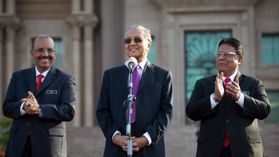 Malaysia's new Prime Minister Dr Mahathir Mohamad speaks to staff from Prime Minister office during his first monthly assembly as prime minister in Putrajaya. Vincent Thian / AP