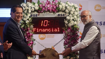 JFS chairman KV Kamath and BSE chairman Subhash Mundra ahead of the listing ceremony in Mumbai. Reuters