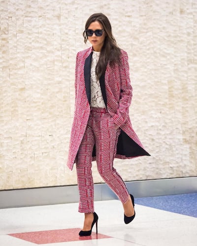 Victoria "Posh Spice: Beckham favours stylish, tailored pieces (and heels). Photo: Getty