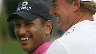 Jeev Milkha Singh of India, left, beat the best including Ernie Els to lift the Singapore Open title.