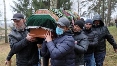 Mourners carry the coffin at the funeral of Yemeni migrant Mustafa Mohammed Murshid al-Raymi in the village of Bohoniki, near the border. EPA