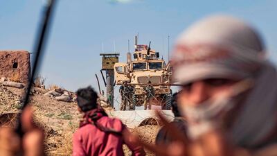 Syrian Kurds take part in a demonstration against Turkish threats to launch an "air and ground" operation in Syria against a Kurdish militia it deems a terrorist group. AFP