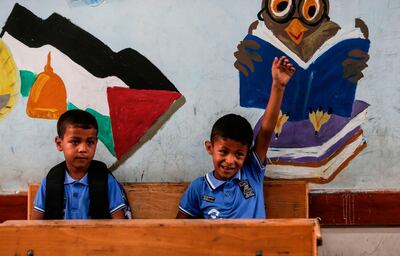Palestinian pupils attend a class at a school run by the United Nations Relief and Works Agency on August 8 in Jabalia refugee camp. AFP