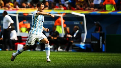 Martin Demichelis of Argentina celebrates as his team scores against Belgium in the 2014 World Cup quarter-finals. Felipe Trueba / EPA / July 5, 2014