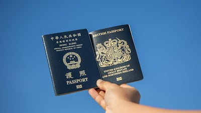 Left, a Hong Kong Special Administrative Region passport and a British National (Overseas) passport, right, which offers Hong Kongers a path to UK citizenship. Bloomberg