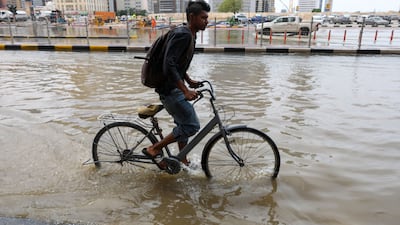 In Sharjah, residents navigated the floods by whatever means they could find