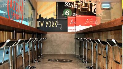 The Pizza Guys’ cosy interiors with bar stools and counters. Courtesy The Pizza Guys