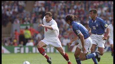 Russia's Andrei Kanchelskis, left, is chased by Paolo Maldini of Italy during an European Championship game at Anfield in 1996. Getty