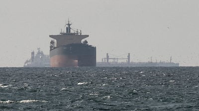 Cargo ships near the Strait of Hormuz, as seen from Ras Al Khaimah. Reuters