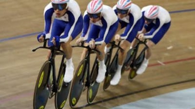 Ed Clancy, Paul Manning, Geraint Thomas and Bradley Wiggins of Great Britain compete during qualifying for the men's team pursuit track cycling event held at the Laoshan Velodrome.
