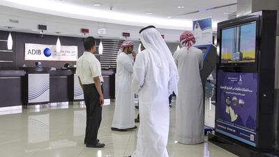 Abu Dhabi Islamic Bank will possibly be lending slightly less to SMEs in 2015, a bank official said. Mona Al Marzooqi / The National