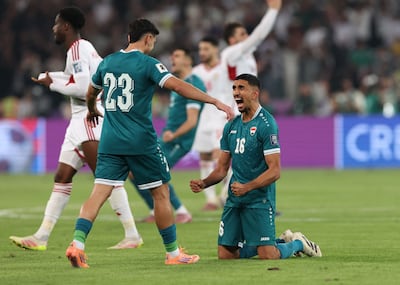 Iraq's Amir Al-Ammari and Merchas Doski celebrate after victory against UAE in World Cup play-off. Reuters