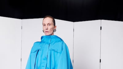 Balenciaga reworks a parka coat into a satin gown with watteau back